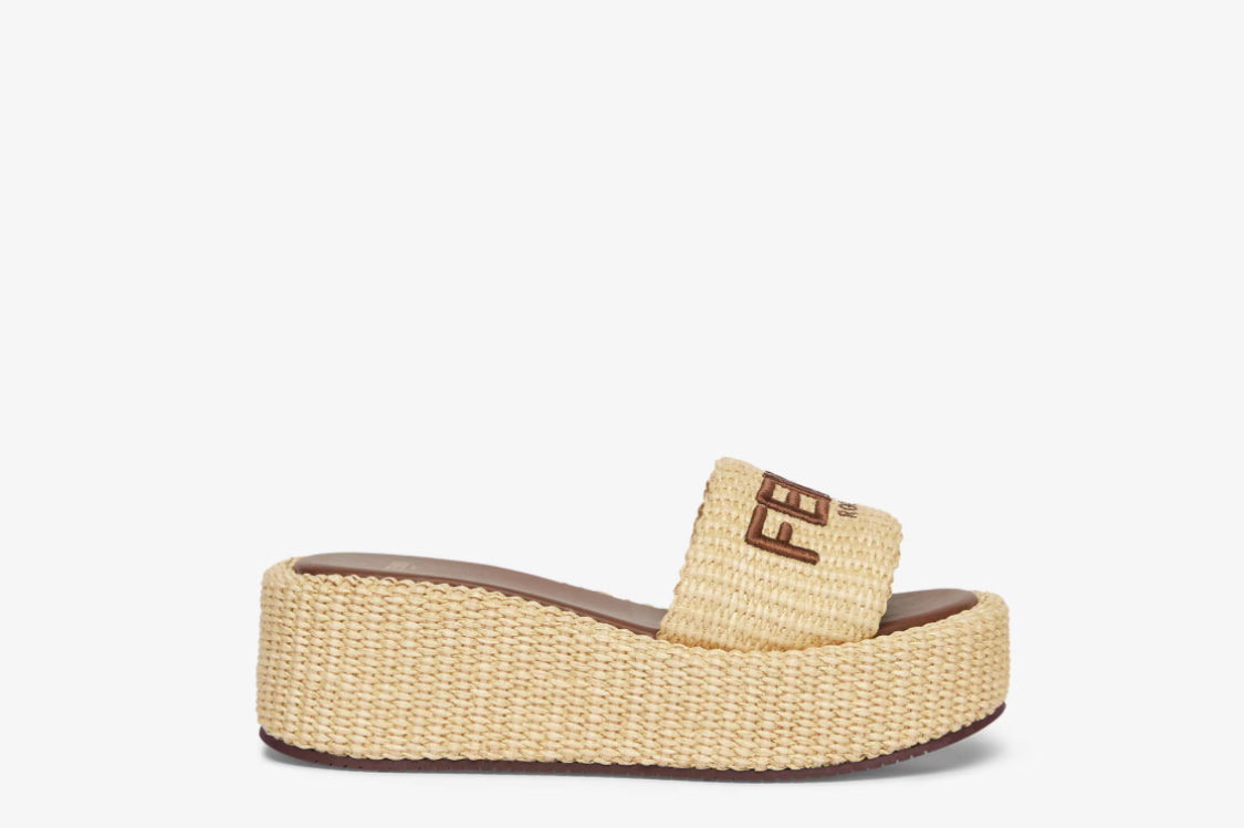 Fendi Sunshine
Beige cotton fiber flatform slides size 10.5