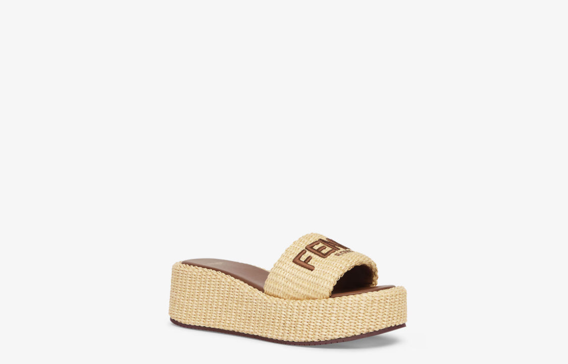 Fendi Sunshine
Beige cotton fiber flatform slides size 10.5